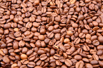 Coffee beans in close up - background
