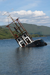 Partially submerged fishing vessel in Loch Linnie © Hugh McKean