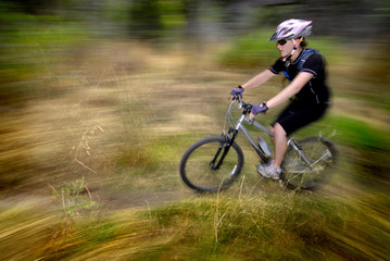 Young Woman Mountain Biking