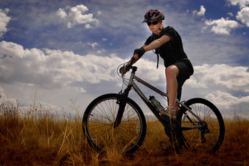 Young Woman Mountain Biking