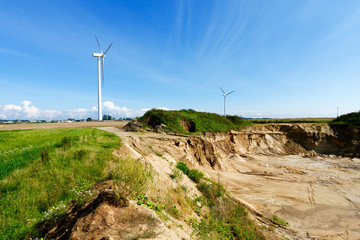 Fototapeta na wymiar Sandpit and wind turbines