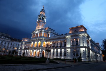 Fototapeta na wymiar The Town Hall in Arad (Transylvania, Romania) by dusk