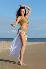 Graceful woman in exotic dress