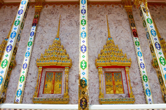 Windows Thai painting of Buddhist temple Thailand