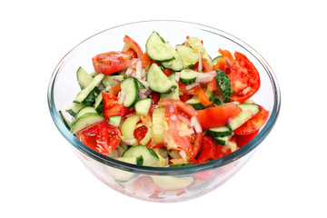 salad in glass bowl isolated