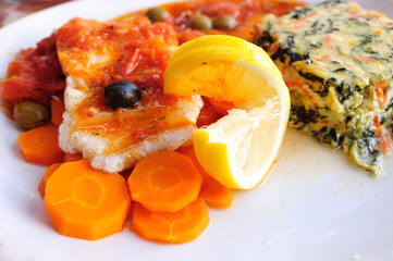 delicious plate of fish and carrot