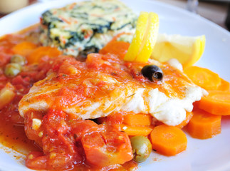 delicious plate of fish and carrot