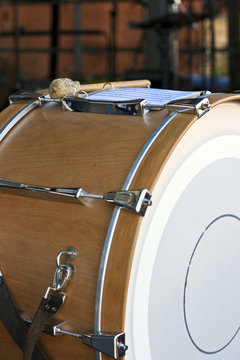 Bass drum with drumstick and notes