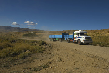 trucks on the pampa (patagonia - argentina)