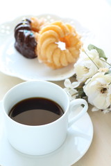 black coffee with flower