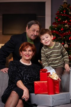Portrait of grandparents and grandson at christmas
