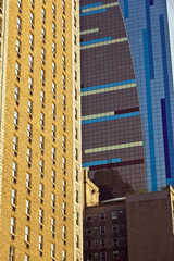 facade of modern skyscraper in New York in afternoon light