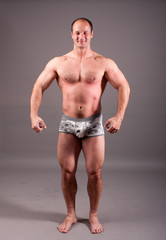 Fototapeta na wymiar mature bodybuilder posing
