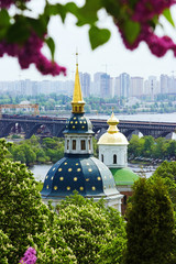 View of church, bridge and the left bank in Kiev, Ukraine