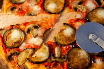 Pizza with eggplants, bell peppers and mushrooms