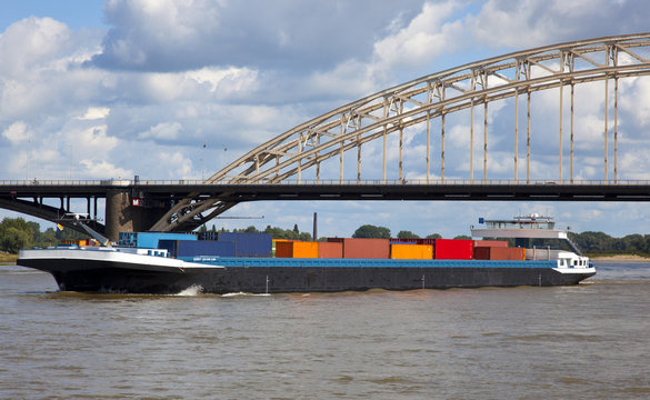 containership on the waal nearby nijmegen
