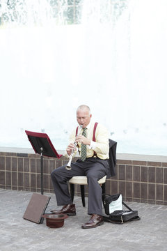 Man Playing The Clarinet