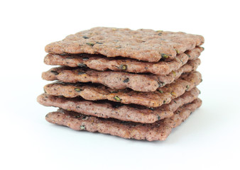 Small stack of purple rice and black sesame toast crackers