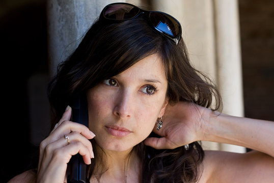 Beautiful woman talking on cell phone
