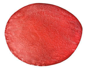 Translucent slice of red grape fruit, macro isolated on white