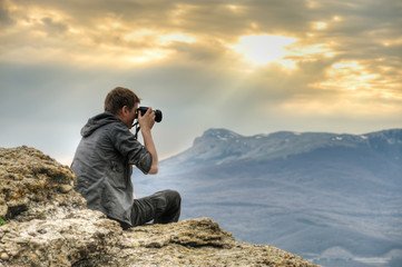 Photographer on rock