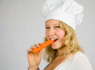 young cook with carrots