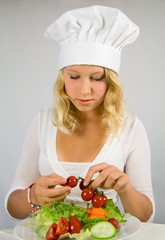 a young cook garnished salad