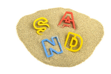 Written sand with colored letters on sand