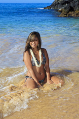 young woman at makena beach in maui, hawaii