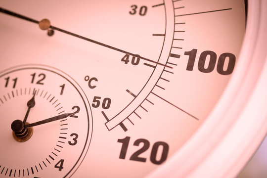 Colorized Round Thermometer Showing Over 100 Degrees