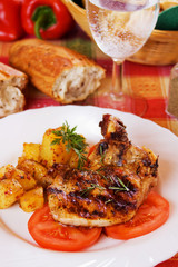 Pork loin chops with baked potato