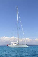 anchored sailboat Formentera turquoise Illetes