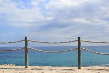 banister railing on marine rope and wood