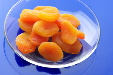 Dried apricots on plate