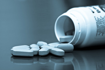 Open container with pills