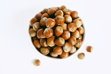 a bowl full of hazelnuts