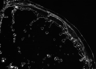 Stylish water splash. Isolated on black background