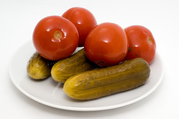 Homemade salted tomatoes and cucumber