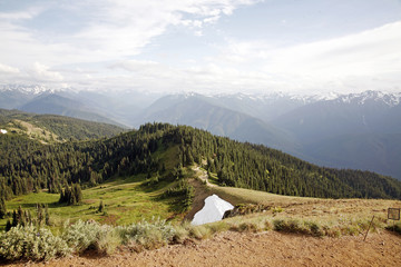 Fototapeta na wymiar View of trail with from high mountain peak.