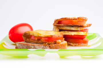 Dish of eggplant, tomatoes and garlic.
