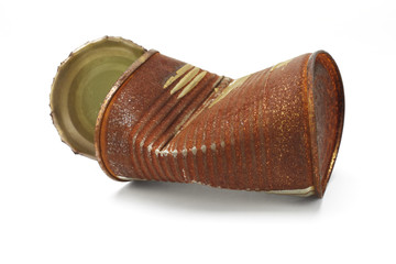 Crumpled and rusty tin can