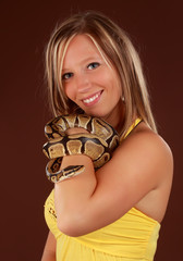 woman holding a snake
