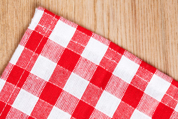 checkered tablecloth on wooden table