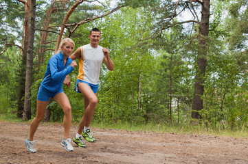 Obraz premium Sportsmen. The young man and the girl