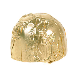Chocolate candy wrapped in golden paper
