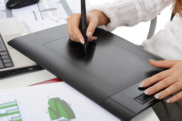 hand on graphic tablet.