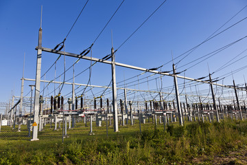Fototapeta premium electrical power plant in farmland area