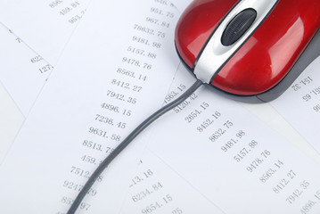 computer mouse with finance charts