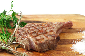 meat and sause on a cutting board