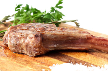 meat and sause on a cutting board